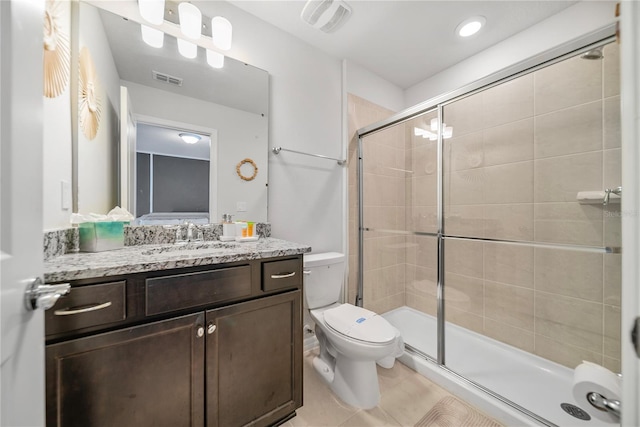 4149 Lana Ave, Davenport, FL 33897 - bathroom with toilet, vanity, a stall shower, and tile patterned floors
