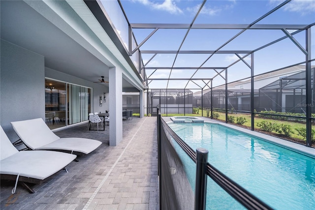 4149 Lana Ave, Davenport, FL 33897 - view of pool with a patio, a pool with connected hot tub, ceiling fan, glass enclosure, and outdoor dining space