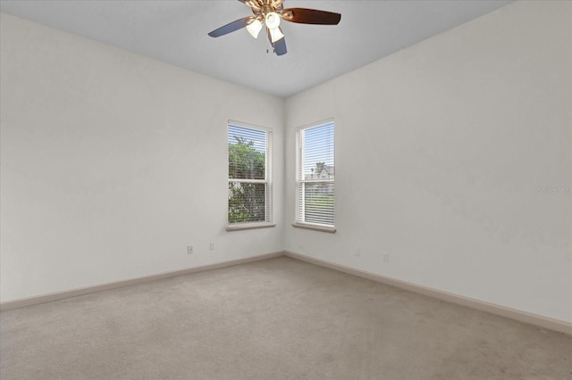 10616 Emerald Chase Dr, Orlando, FL 32836 - empty room featuring light colored carpet, ceiling fan, and baseboards