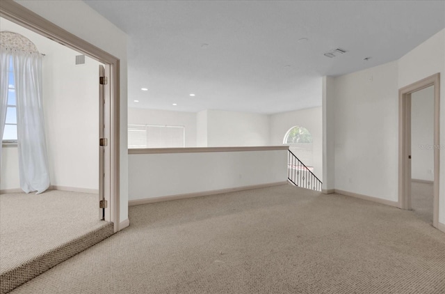 10616 Emerald Chase Dr, Orlando, FL 32836 - empty room with light carpet, baseboards, and visible vents