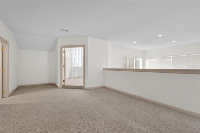 10616 Emerald Chase Dr, Orlando, FL 32836 - spare room featuring a wealth of natural light, visible vents, light carpet, and baseboards