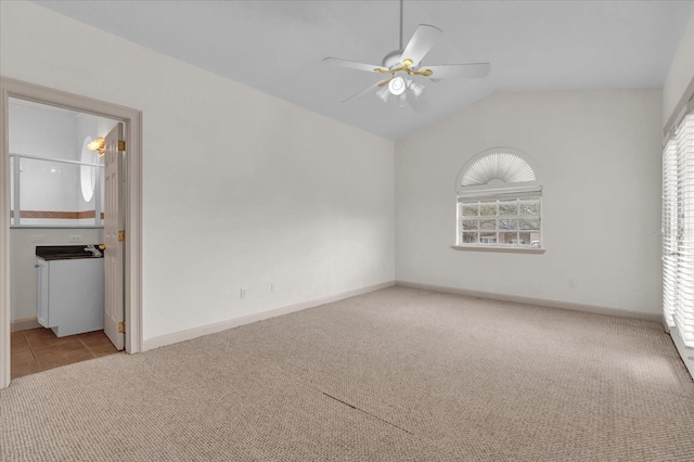 10616 Emerald Chase Dr, Orlando, FL 32836 - unfurnished room featuring lofted ceiling, light colored carpet, ceiling fan, and baseboards