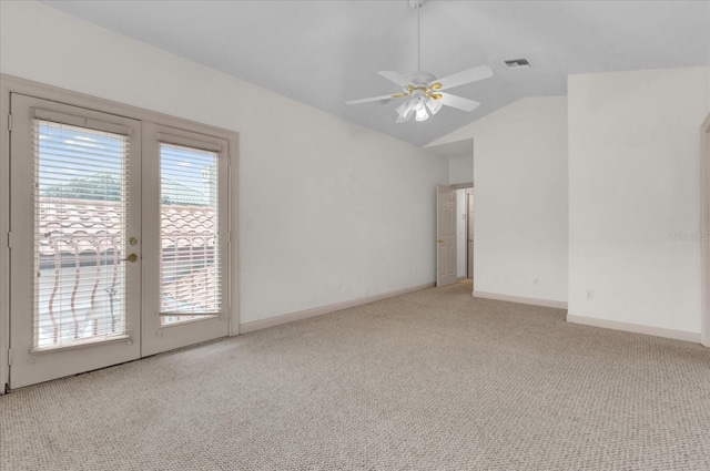 10616 Emerald Chase Dr, Orlando, FL 32836 - unfurnished room with light carpet, baseboards, visible vents, a ceiling fan, and vaulted ceiling