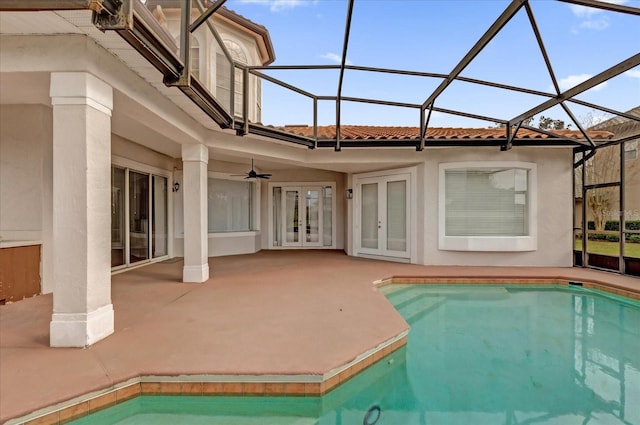 10616 Emerald Chase Dr, Orlando, FL 32836 - outdoor pool featuring a ceiling fan, a patio area, french doors, and glass enclosure