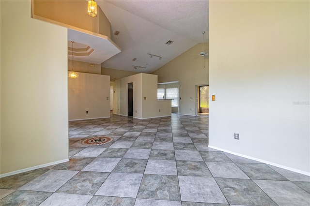 unfurnished living room featuring high vaulted ceiling, visible vents, baseboards, and a ceiling fan