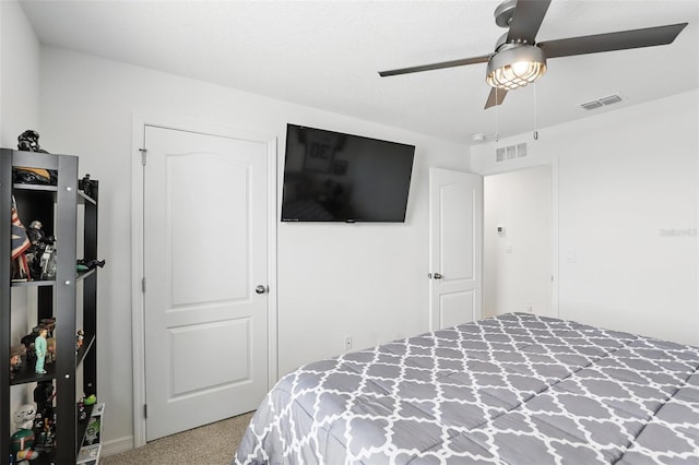 bedroom featuring visible vents and ceiling fan