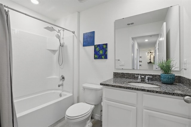 bathroom featuring shower / tub combo, visible vents, vanity, and toilet