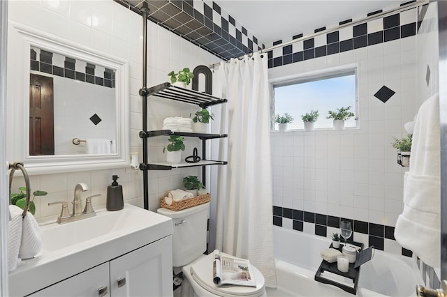 bathroom with tile walls, toilet, shower / tub combo with curtain, vanity, and backsplash