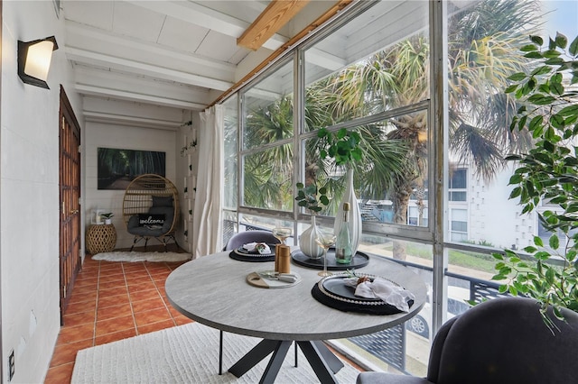 sunroom / solarium with beam ceiling and plenty of natural light