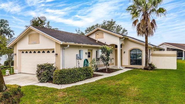 ranch-style house with a garage, a front yard, concrete driveway, and stucco siding