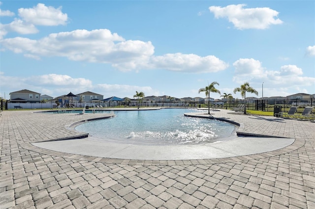 411 Lily Ln, Davenport, FL 33837 - community pool with a residential view