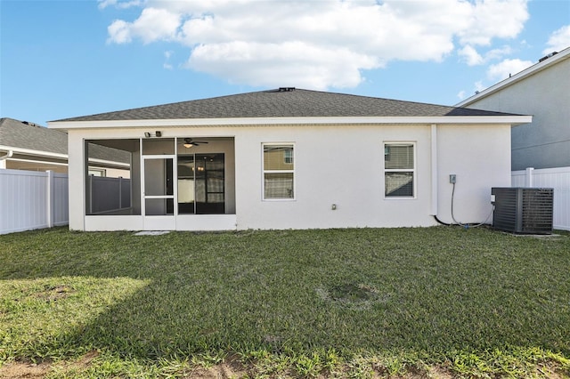 411 Lily Ln, Davenport, FL 33837 - rear view of property with a sunroom, ceiling fan, and stucco siding