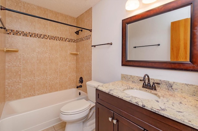 full bathroom with toilet,  shower combination, tile patterned flooring, a textured ceiling, and vanity