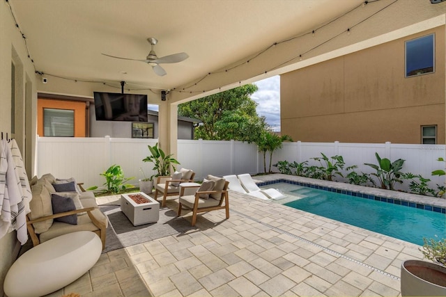 view of pool with an outdoor fire pit, a fenced backyard, a fenced in pool, and a patio