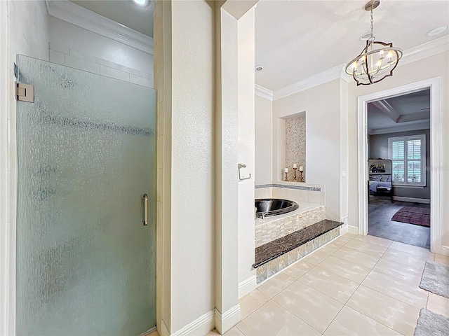 full bathroom with tile patterned flooring, a shower stall, baseboards, and crown molding