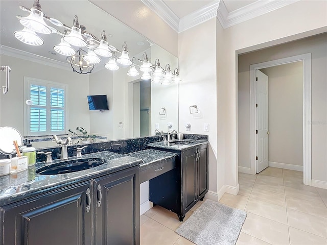 bathroom with a notable chandelier, baseboards, tile patterned floors, and crown molding