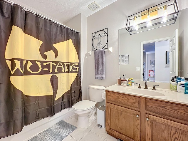 full bath with visible vents, toilet, tile patterned flooring, a textured ceiling, and vanity