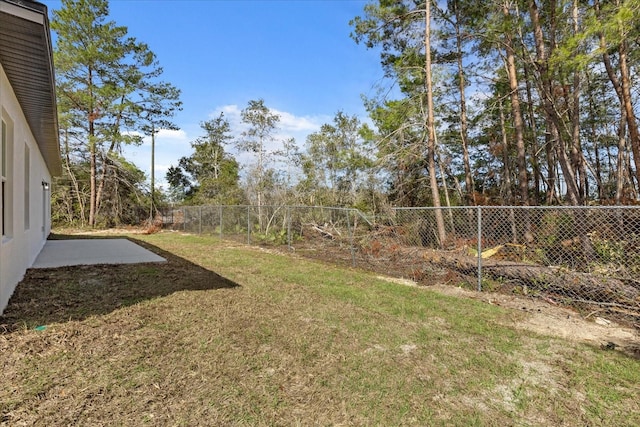 view of yard featuring a fenced backyard and a patio