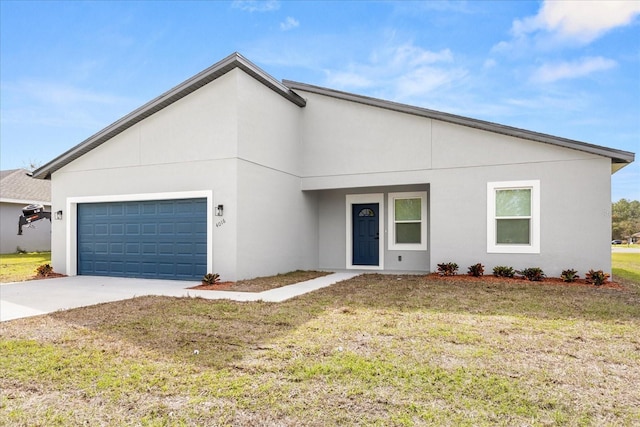 single story home featuring a garage, a front yard, concrete driveway, and stucco siding