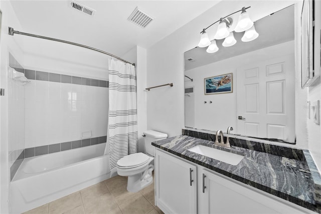 full bathroom featuring shower / bath combo, vanity, visible vents, and tile patterned floors