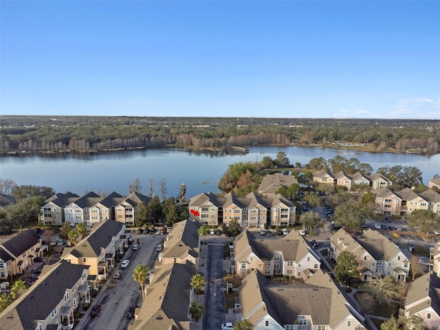 birds eye view of property featuring a residential view and a water view