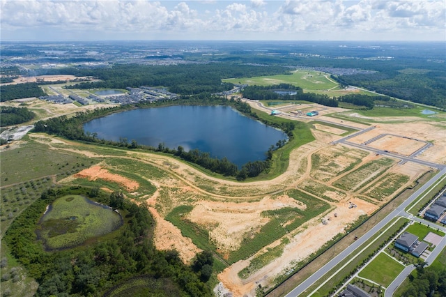 birds eye view of property with a water view and a rural view