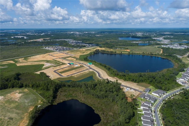 drone / aerial view with a water view