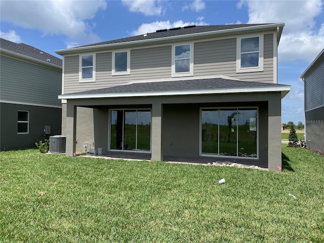 17505 Glossy Pomelo Way, Winter Garden, FL 34787 - rear view of property with a yard and stucco siding