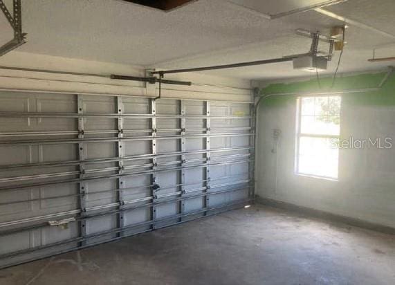 garage featuring baseboards