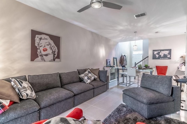 17437 Promenade Dr, Clermont, FL 34711 - tiled living area with a ceiling fan