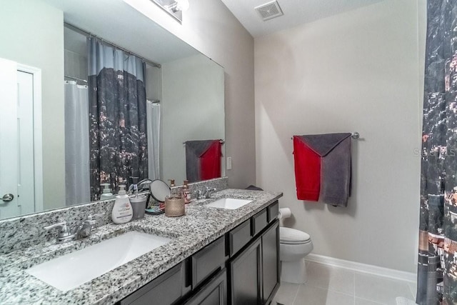 17437 Promenade Dr, Clermont, FL 34711 - bathroom featuring double vanity and tile patterned flooring