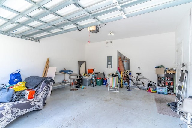 17437 Promenade Dr, Clermont, FL 34711 - garage featuring a garage door opener and electric panel