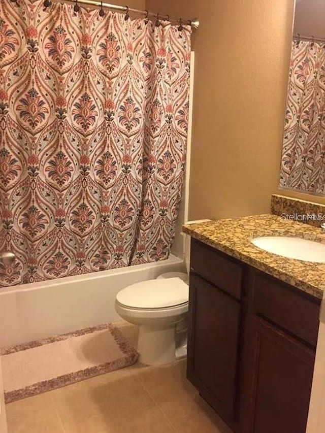 1560 Chelsea Dr, Davenport, FL 33897 - bathroom featuring toilet, vanity, and tile patterned floors