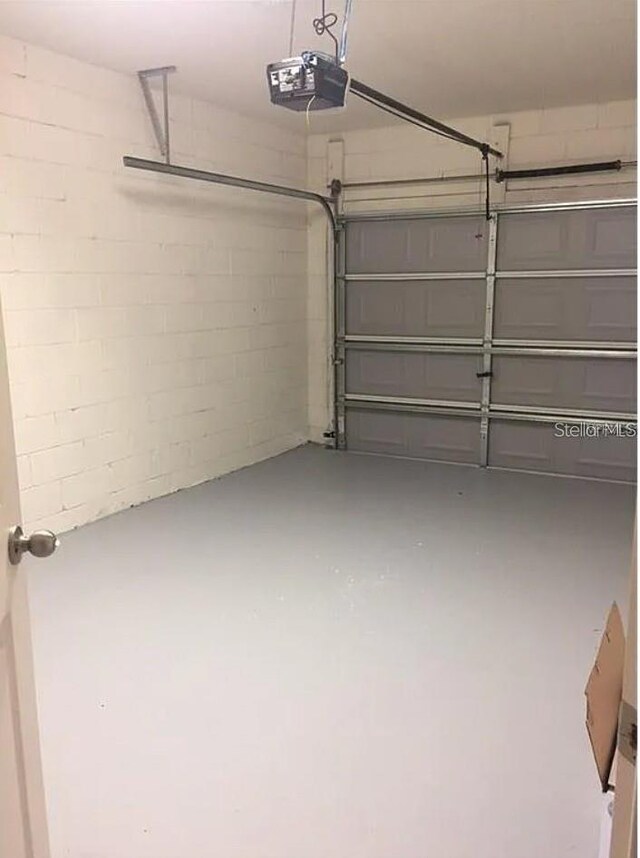 1560 Chelsea Dr, Davenport, FL 33897 - garage with a garage door opener