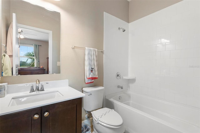 bathroom with toilet, shower / bathing tub combination, vanity, and a ceiling fan