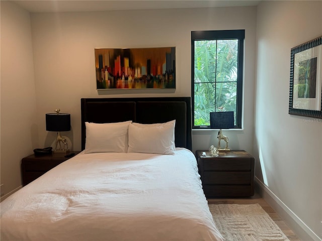 bedroom featuring baseboards