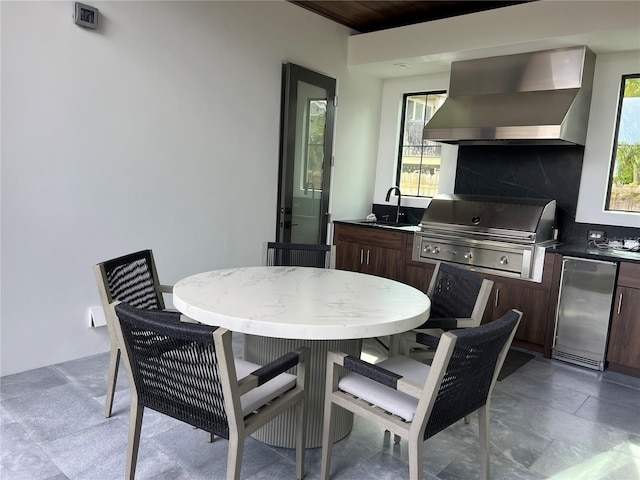 dining space featuring plenty of natural light