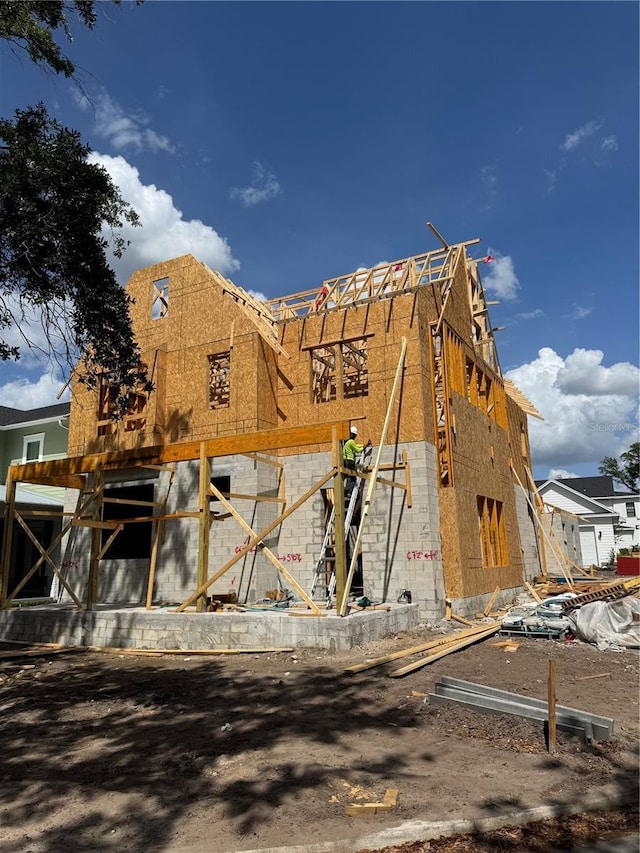 view of side of home with stucco siding
