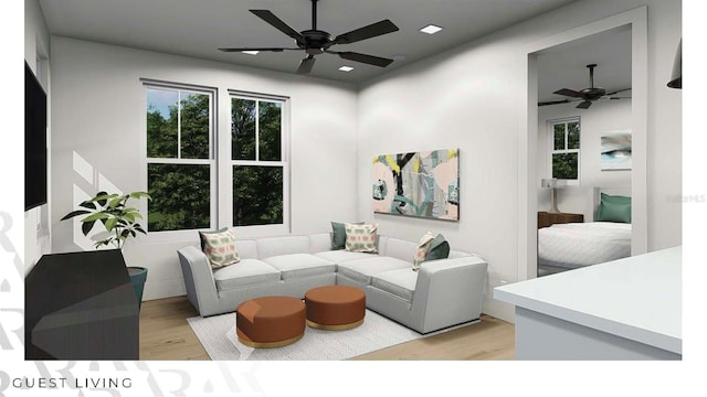 166 Hammock Preserve Loop, Winter Garden, FL 34787 - living room with a ceiling fan and light wood-style floors