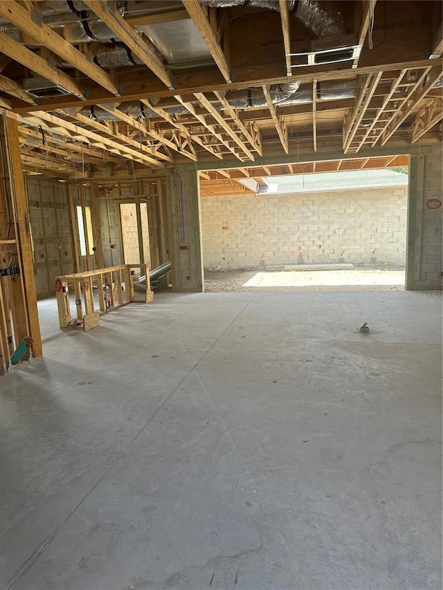 166 Hammock Preserve Loop, Winter Garden, FL 34787 - miscellaneous room with unfinished concrete floors