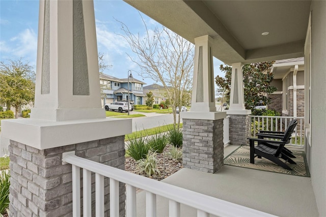 view of patio featuring a residential view and covered porch