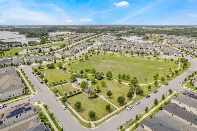 aerial view with a water view and a residential view