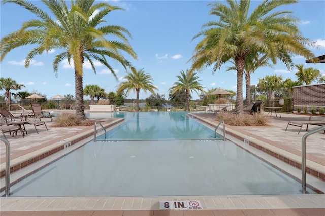 pool with a patio