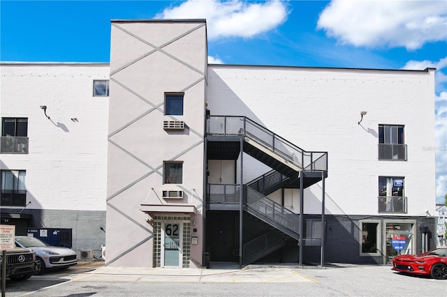 view of building exterior featuring stairs