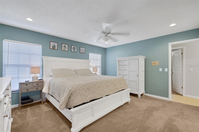 bedroom featuring light carpet, ceiling fan, recessed lighting, and baseboards