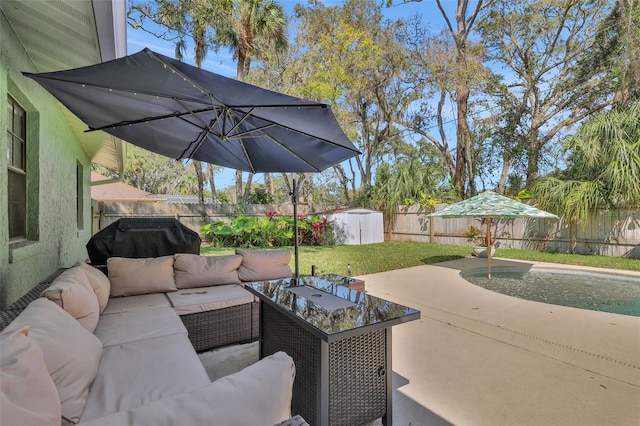 view of patio with outdoor lounge area and a fenced backyard