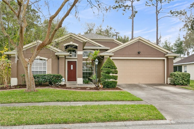 view of front of house with a garage, concrete driveway, and stucco siding