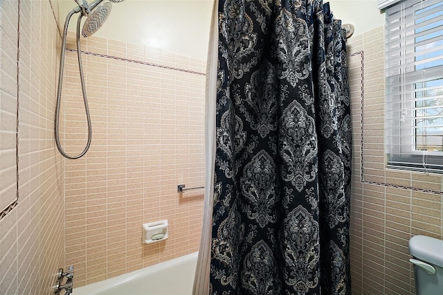 full bathroom with shower / bath combo with shower curtain