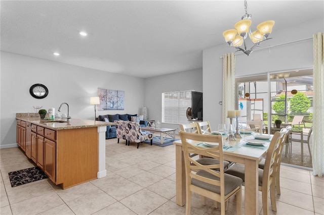 dining space featuring light tile patterned floors, baseboards, a chandelier, and recessed lighting