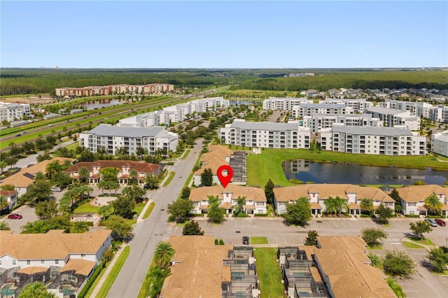 drone / aerial view featuring a water view